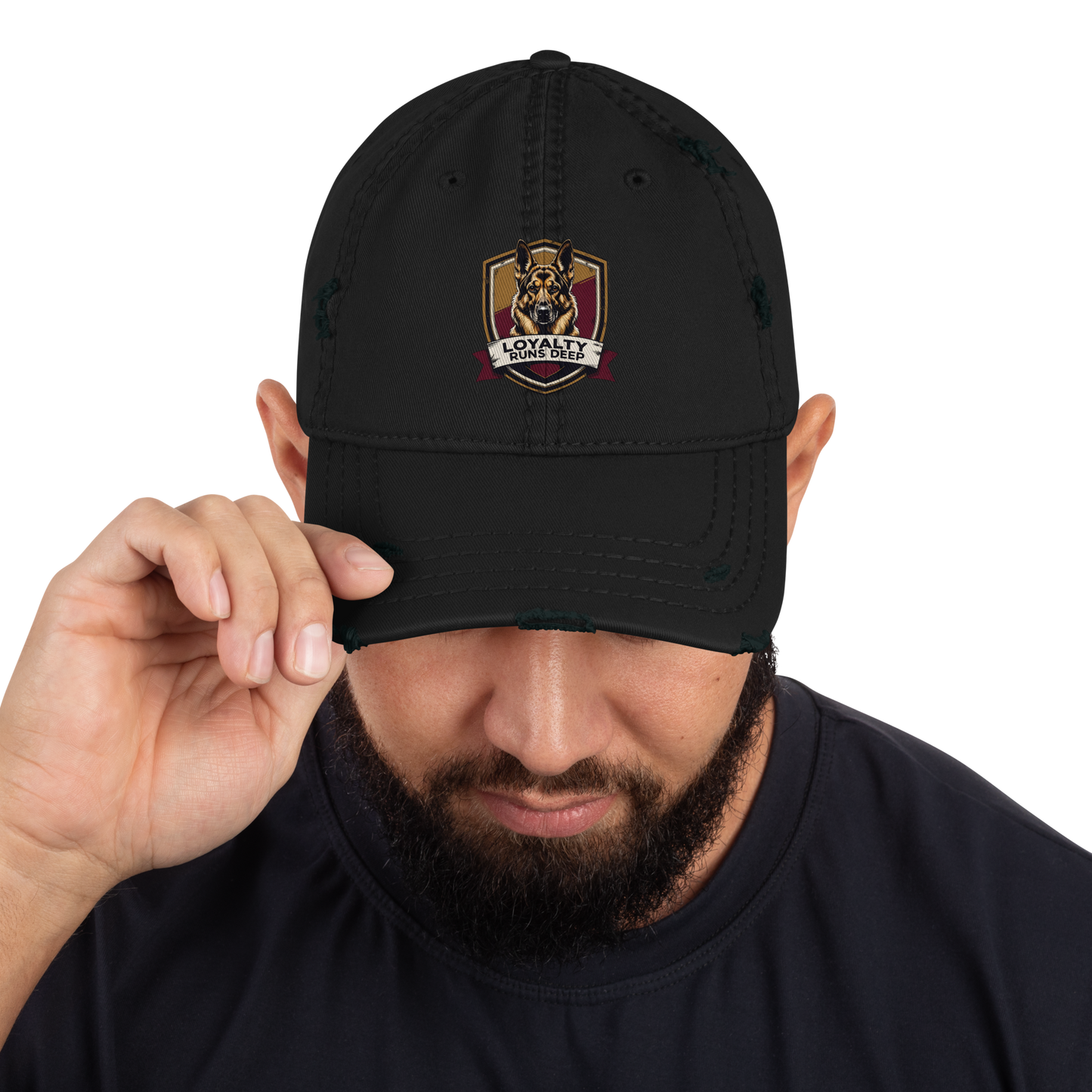 Black distressed cap with a dog logo and text "Loyalty Runs Deeps" on a white background