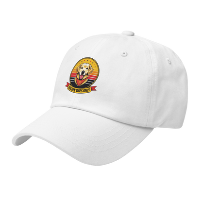 White cap with a dog graphic and 'Golden vibes only' text on a white background