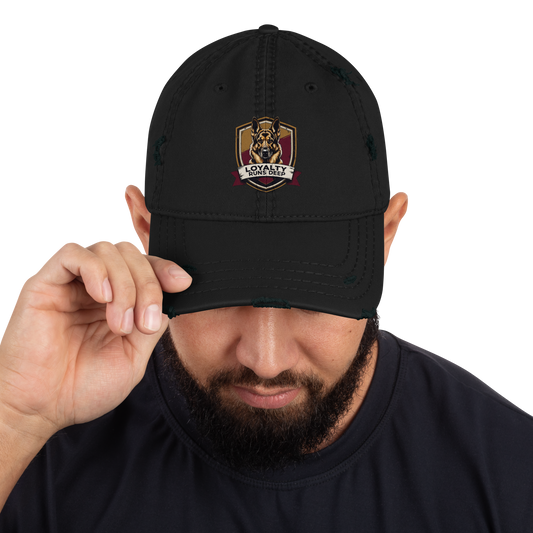 Black distressed cap with a dog logo and text "Loyalty Runs Deeps" on a white background