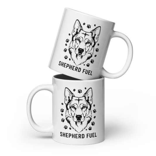 Two white mugs with black dog illustrations and 'Shepherd Fuel' text on a white background